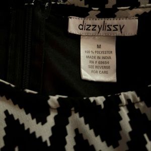 Dizzy Lizzy chevron dress. Sleeves cutout from shoulder down.